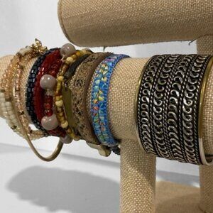 9 bracelets bundle in various materials including beads